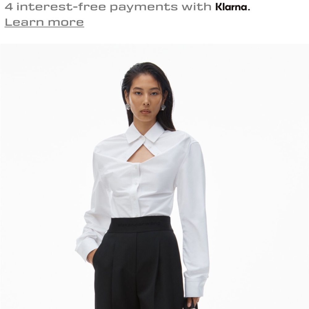 High waisted pleated trousers with logo elastic